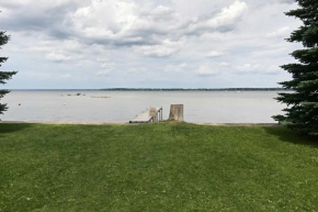 Peaceful Lakefront Houghton Lake Property with Patio